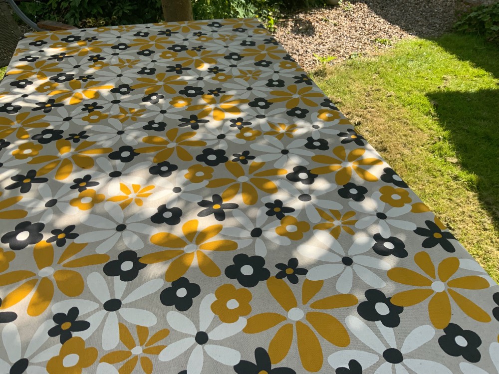 Hippy Flowers French Oilcloth in Yellow